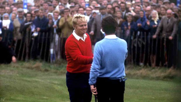 Jack Nicklaus (left) and Tony Jacklin after halving their match in the 1969 Ryder Cup at the Royal Birkdale Links.